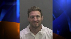 Jason Miller is shown in a 2012 booking photo related to an incident in Mission Viejo.