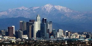 The snow-capped San Gabriel Mountains are a backdrop to the Los Angeles skyline as seen from Kenneth Hahn State Recreation Area in Baldwin Hills after a December 2009 storm. (Credit: Genaro Molina /Los Angeles Times)