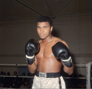 World heavyweight boxing champion Muhammad Ali in training at the Royal Artillery Gymnasium in London for his upcoming fight with British champion Henry Cooper, against whom he must defend his title. (Credit: Getty Images)