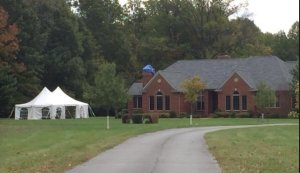 A couple was found dead in their home hours after exchanging wedding vows, and the reception tent was still in the yard. (Credit: Vigo County Sheriff Department)