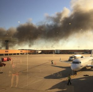 A plane appears to have crashed at a building at Wichita's Mid-Continent Airport in southern Kansas on Thursday morning, CNN affiliate KSNW reported. (Credit: Jeffrey Hough)