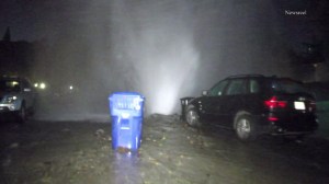 A water main ruptured on a street in Studio City on Friday, Oct. 10, 2014. (Credit: Newsreel)