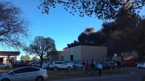 A plane appears to have crashed at a building at Wichita's Mid-Continent Airport in southern Kansas on Thursday morning, CNN affiliate KSNW reported. (Credit: Courtesy Ryan Weatherby via CNN Wire)