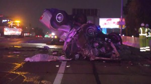 A pickup truck was hit by a wrong-way driver in a white Acura sedan on the 110 Freeway in downtown Los Angeles on Thursday, Nov. 13, 2014, authorities said. (Credit: KTLA)