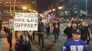 Marchers in downtown Los Angeles showed support for Ferguson protesters on Nov. 26, 2014. (Credit: KTLA/Steve Kuzj)