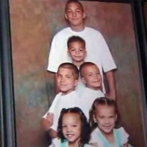 A family photo shows Brandi Morales' six children.