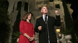 Gov. Jerry Brown delivers his victory speech with wife Anne Gust Brown at his side in front of the governor's mansion in Sacramento. (Credit: Los Angeles Times)