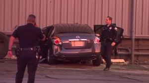 One person was killed after a car crashed into a building in Boyle Heights on Nov. 23, 2014. (Credit: KTLA)