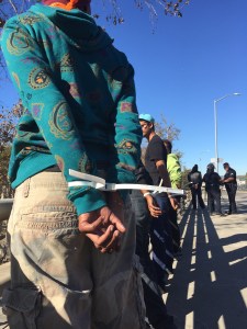 Seven people were arrested in protests on the 101 Freeway on Nov. 26, 2014. (Credit: Pat Kightlinger/KTLA)