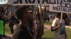 About 35 people participated in Ferguson-related protests outside the Staples Center in downtown L.A. on Nov. 29, 2014. (Credit: KTLA)