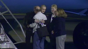 Matthew Todd Miller, who had been held in North Korea since April, greets members of his family after he arrived at Joint Base Lewis-McChord, Wash., on Saturday, Nov. 8, 2014. (Photo via CNN)