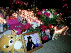 A memorial honored three girls killed while trick-or-treating in Santa Ana on Oct. 31, 2014. (Credit: Steve Kuzj/ KTLA)