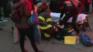 A woman was treated for minor injuries after she was struck by a car during a protest in Minneapolis, Minnesota over the Ferguson grand jury decision. (Credit: CNN) 