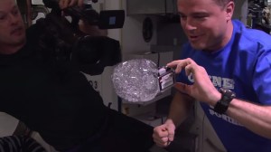 NASA astronauts put a GoPro camera in floating water bubble in space. (Credit: NASA/via CNN)