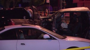 A 70-year-old passenger died after a suspected street racing crash in Paramount on Wednesday, Nov. 12, 2014, authorities said. (Credit: KTLA)