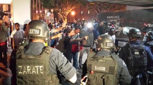 Tensions running high as protesters confront police near 6th and Hope streets in Downtown Los Angeles on Wednesday. (Credit: KTLA)