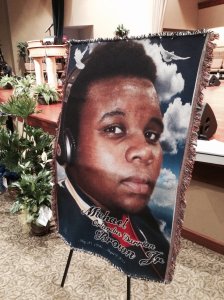 A large memorial photo of slain teenager Michael Brown inside Friendly Temple Missionary Baptist Church in St. Louis, the site of Brown's funeral on Aug. 25, 2014. (Credit: pool)