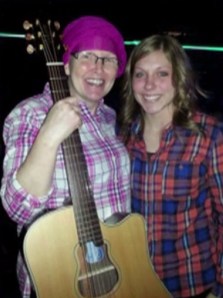 Teresa Shaw (left) received this guitar from Garth Brooks after a Minneapolis show on Friday, Nov. 7, 2014. (Credit: CNN)