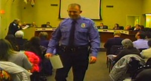 Officer Darren Wilson is seen attending a Feb.11, 2014, City Council meeting.  (Credit: City of Ferguson)