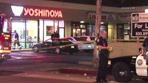 A man was shot and killed outside a fast-food restaurant in Inglewood on Sunday, Nov. 9, 2014, police said. (Credit: OnScene.tv HD)