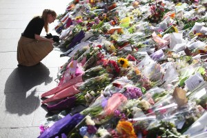 Flowers are left as a sign of respect at Martin Place on Wednesday, Dec. 17, 2014, in Sydney, Australia. (Credit: Joosep Martinson/Getty Images)