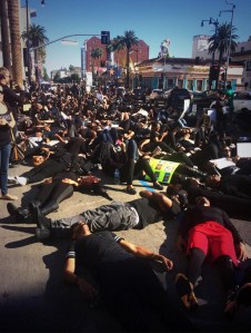 Participants in the #BlackOutHollywood protest on Dec. 6, 2014, are seen during a "die in." (Credit: Mark Mester/ KTLA)