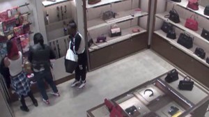 Police released surveillance video Dec. 19, 2014, that captured a theft at a Glendale Bloomingdale's the previous month. Four people were being sought.