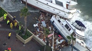 Boats were washed up against the shore in Avalon Harbor on Dec. 31, 2014. (Credit: KTLA)