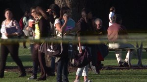 Students are seen outside Bolsa Grande High School in Garden Grove on Tuesday, Dec. 9, 2014, after a bomb threat investigation prompted a lockdown of the campus. (Credit: KTLA)