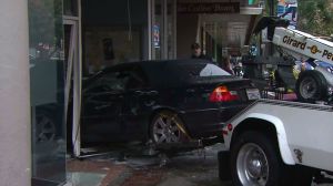 A car accidentally drove into an AT&T store and a Coffee Bean in downtown Burbank on Dec. 16, 2014. CREDIT: KTLA