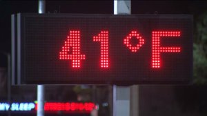 A sign at a Canoga Park gas station indicated a chilly temperature on Saturday, Dec. 27, 2014. (Credit: KTLA)