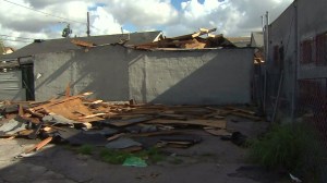 High winds described as a tornado left debris in the Vermont-Slauson neighborhood on Dec. 12, 2014. (Credit: KTLA)