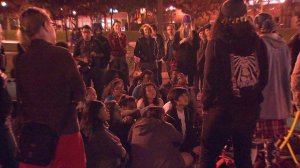 Protesters sat outside an Iggy Azalea concert at USC on Dec. 4, 2014. (Credit: KTLA)