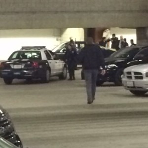 Police responded to a Hollywood & Highland parking garage after an officer shot a woman in the leg Friday, Dec. 26, 2014. (Credit: Mark Mester/KTLA)