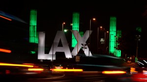 The 100-foot LAX Gateway pylons at Los Angeles International Airport are lit green on March 23, 2013. (Credit: Frederic J. Brown/AFP/Getty Images) 