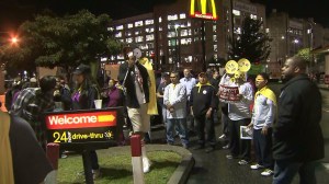 Striking workers, demanding a $15 an hour wage, are seen outside a McDonald's restaurant in Los Angeles on Thursday, Dec. 4, 2014.  (Credit: KTLA)