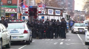 Two NYPD officers shot in the head and killed on Dec. 20, 2014. (Credit: PIX11)