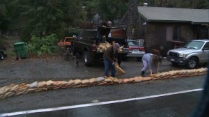 Residents of Silverado Canyon placed sandbags in front of their home amid concerns about mudslides on Wednesday, Dec. 3, 2014. (Credit: KTLA)