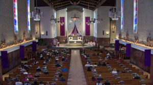 A service held Dec. 18, 2014, at St. James Catholic Church honored those killed and injured in the crash the previous night. (Credit: KTLA)