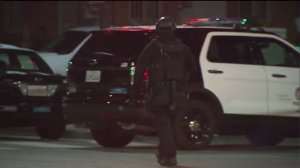 A massive manhunt was underway in South LA in the early morning hours of Dec. 29, 2014, after two officers were fired upon the previous night. (Credit: KTLA) 