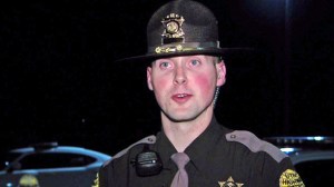 Trooper Andrew Pollard of the Utah Highway Patrol helped escort an 87-year-old woman to a hospital so that she could see her gravely ill son. (Credit: KUTV/via CNN)