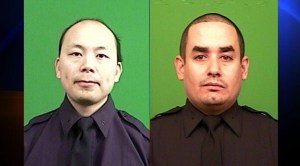 New York Police Department Officers Wenjian Liu, left, and Rafael Ramos were killed in an ambush-style killing in Brooklyn on Saturday, Dec. 20, 2014, Commissioner William Bratton said. (Credit: NYPD)