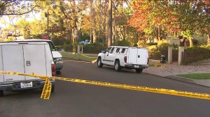 Homicide detectives were combing for clues on Dec. 23, 2014, one day after an 86-year-old woman was found dead inside her home in the Windsor Square neighborhood of Los Angeles. (Credit: KTLA) 