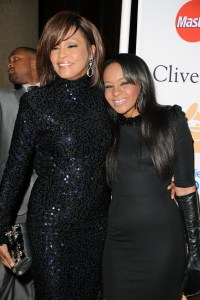 Singer Whitney Houston and her daughter, Bobbi Kristina Brown, arrive at the 2011 Pre-Grammy Gala and Salute To Industry Icons Honoring David Geffen at the Beverly Hilton Hotel on Feb. 12, 2011, in Beverly Hills. (Credit: Jason Merritt/Getty Images)