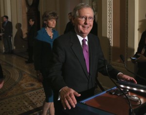 Sen. Majority Leader Mitch McConnell (R-KY) speaks while flanked by Sen. Lisa Murkowski (R-AK), left, on Jan. 29, 2015 at the U.S. Capitol in Washington, DC. (Credit: Mark Wilson/Getty Images)