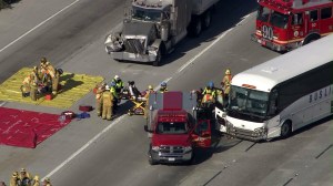 Thirty people were injured after two big rigs and a tour bus crashed in Hacienda Heights on Jan. 7, 2015. (Credit: KTLA)