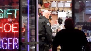 A security guard at an adult store in Anaheim allegedly detained a robber with a machete on Jan. 2, 2015. (Credit: OC HAWK)