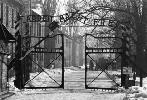 The gates of the Nazi concentration camp at Auschwitz, Poland, circa 1965. The sign above them is 'Arbeit Macht Frei' - 'Work Makes You Free'. (Photo by Keystone/GettyImages) 