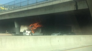A big rig caught fire on the 10 Freeway in City Terrace on Jan. 13, 2015. (Credit: Cynthia Gonzalez) 