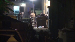 San Diego County investigators were combing for clues after the body of an infant was found in a dumpster at a strip mall on Jan. 5, 2015. (Credit: KSWB) 